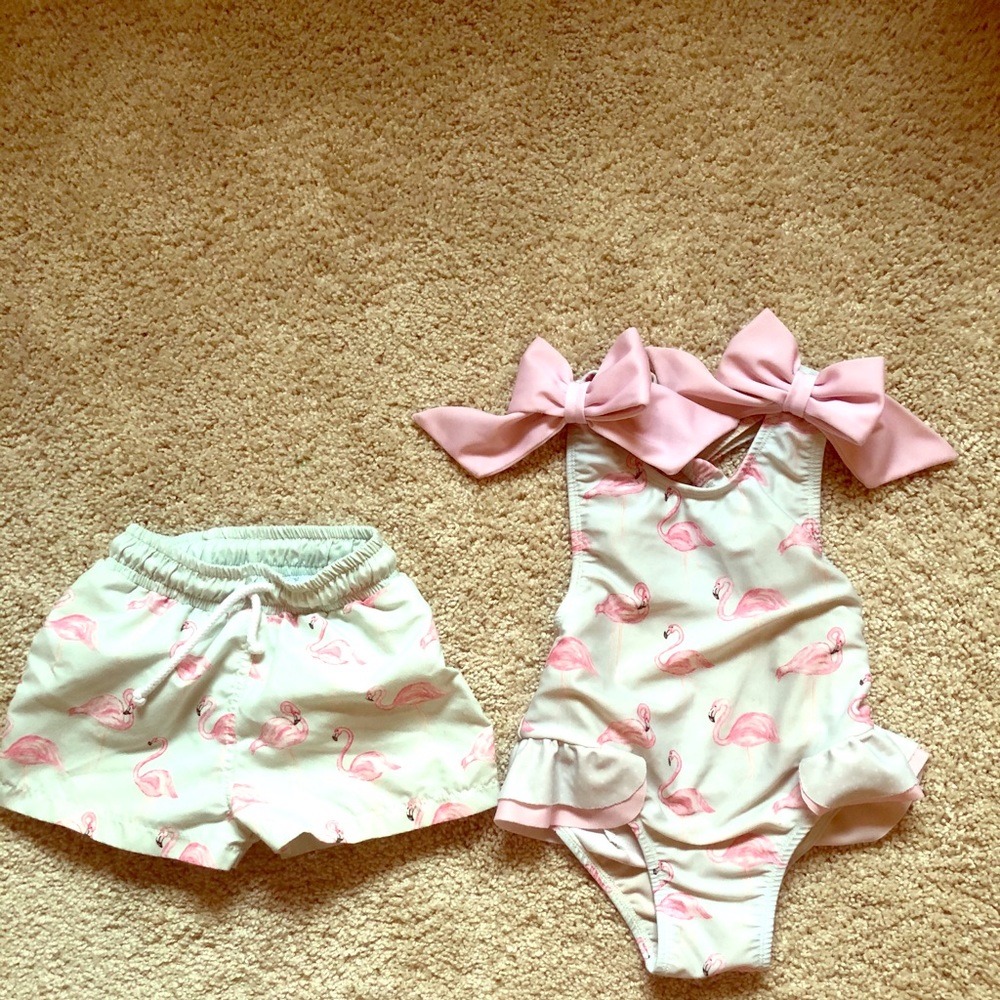 Matching boy/girl flamingo swimsuits